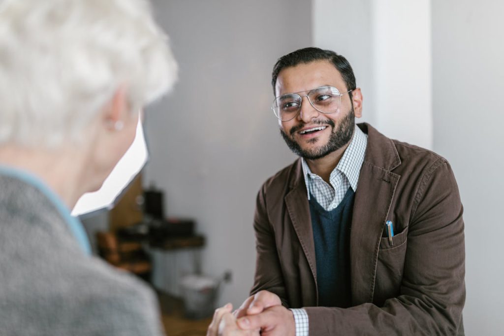 A Man Shaking a Woman Hand